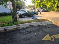 People hanging out in the parking lot all day long.