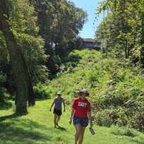 Walking along the river below the house