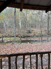 Sitting on the porch you can see and hear the creek.
