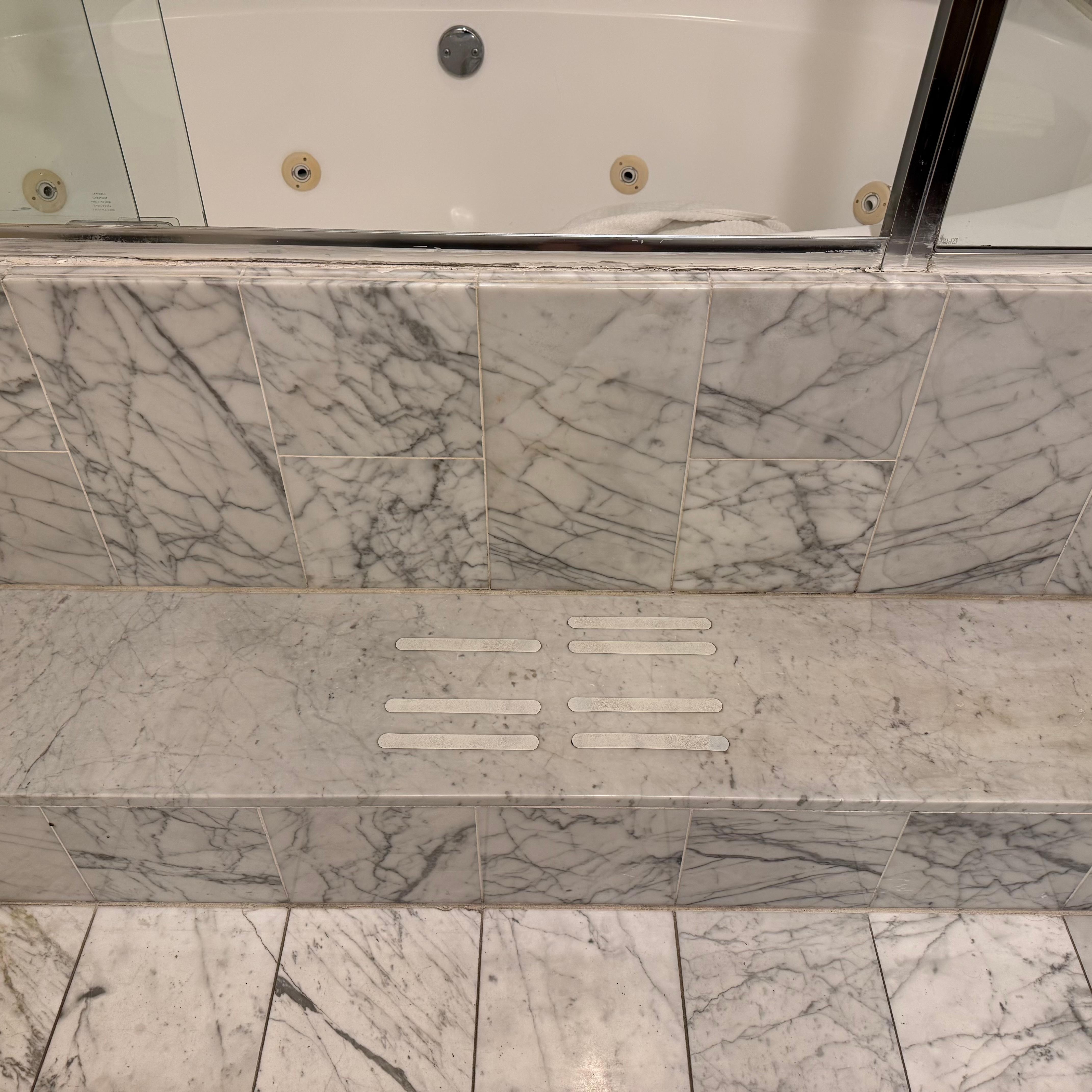 Big clunky jacuzzi tub that is hard to step into. 