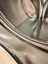 Inoperable Washing Machine with standing water.