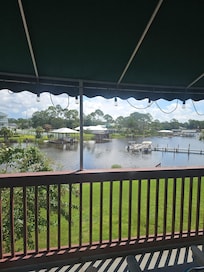 View of lagoon and our boat off of balcony. Weather not so good that day.