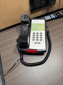 Broken phone in room.