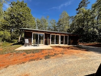 There are three sets of sliding doors on the front to let in tons of light.