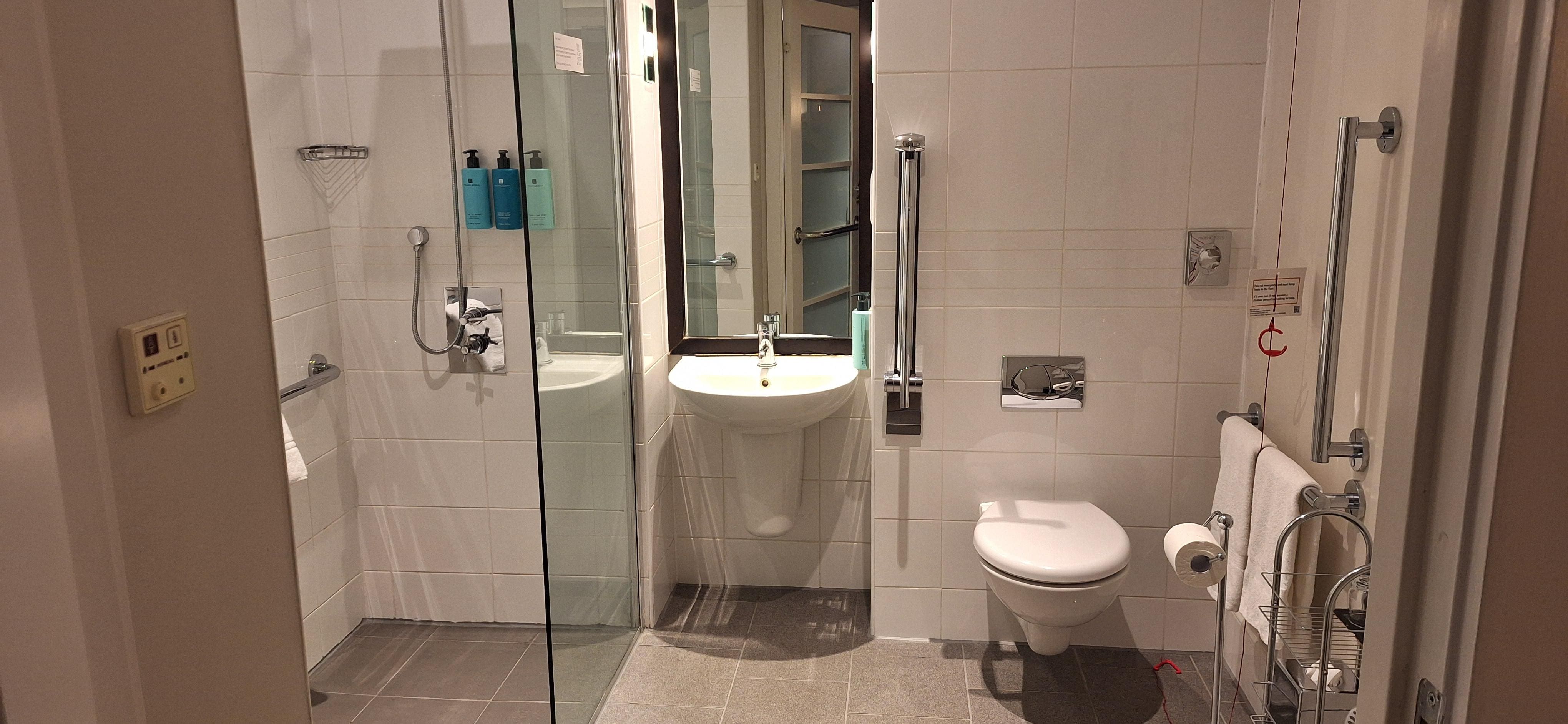 Bathroom with walk-in shower (no step)- shower seat 