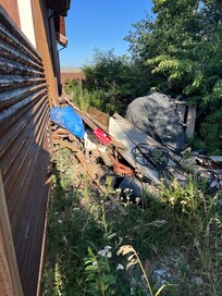 Side of garage, right by door you use to enter/exit.