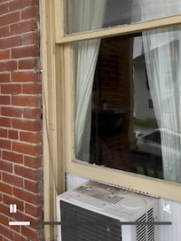 Window unit that could easily be pushed in from the porch