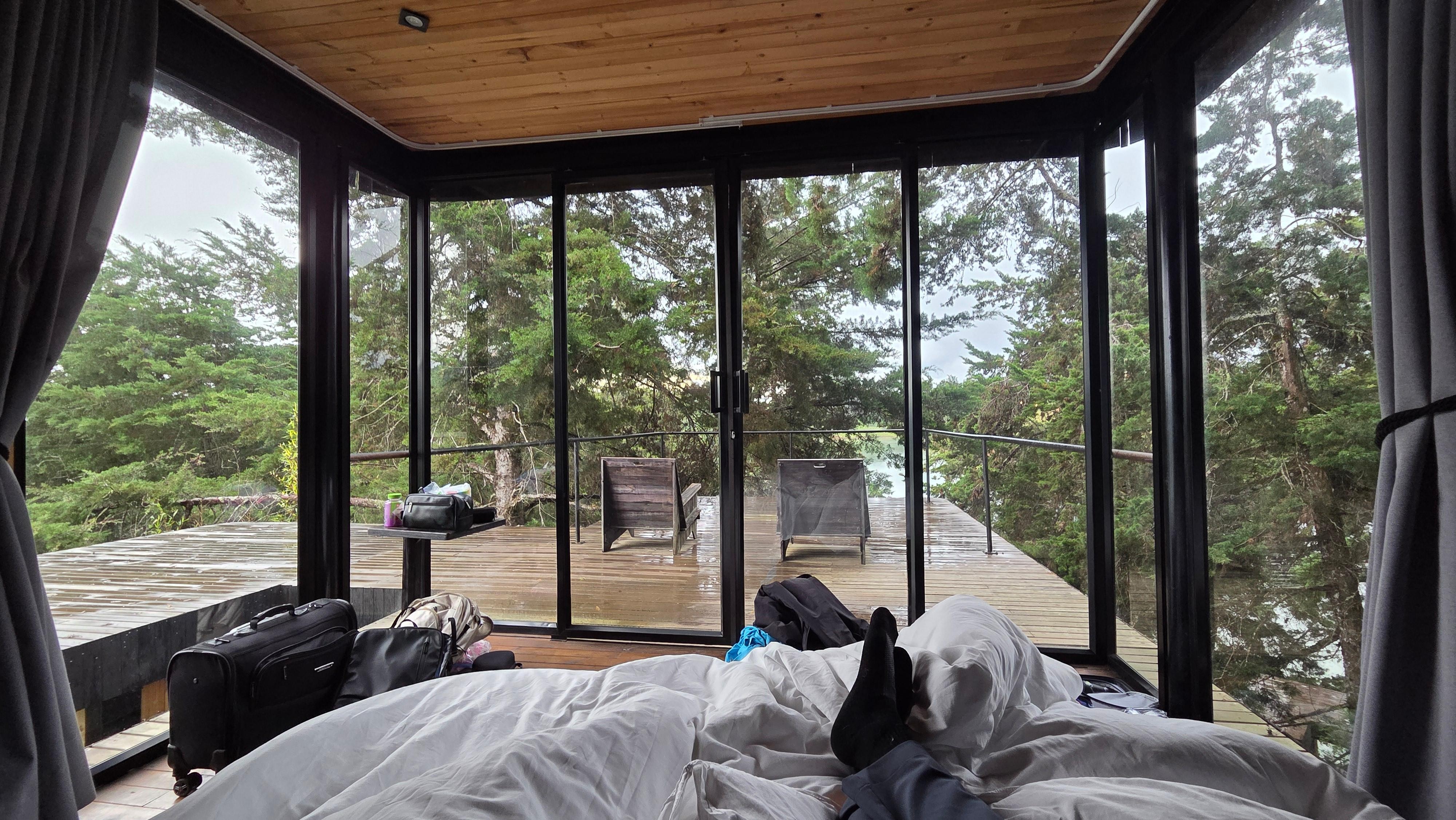 Panoramic window views from bed! Upper bedroom of cabin 13!