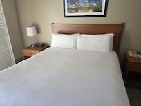 Bed must of been a California king this bed was massive comfy slept throughout night