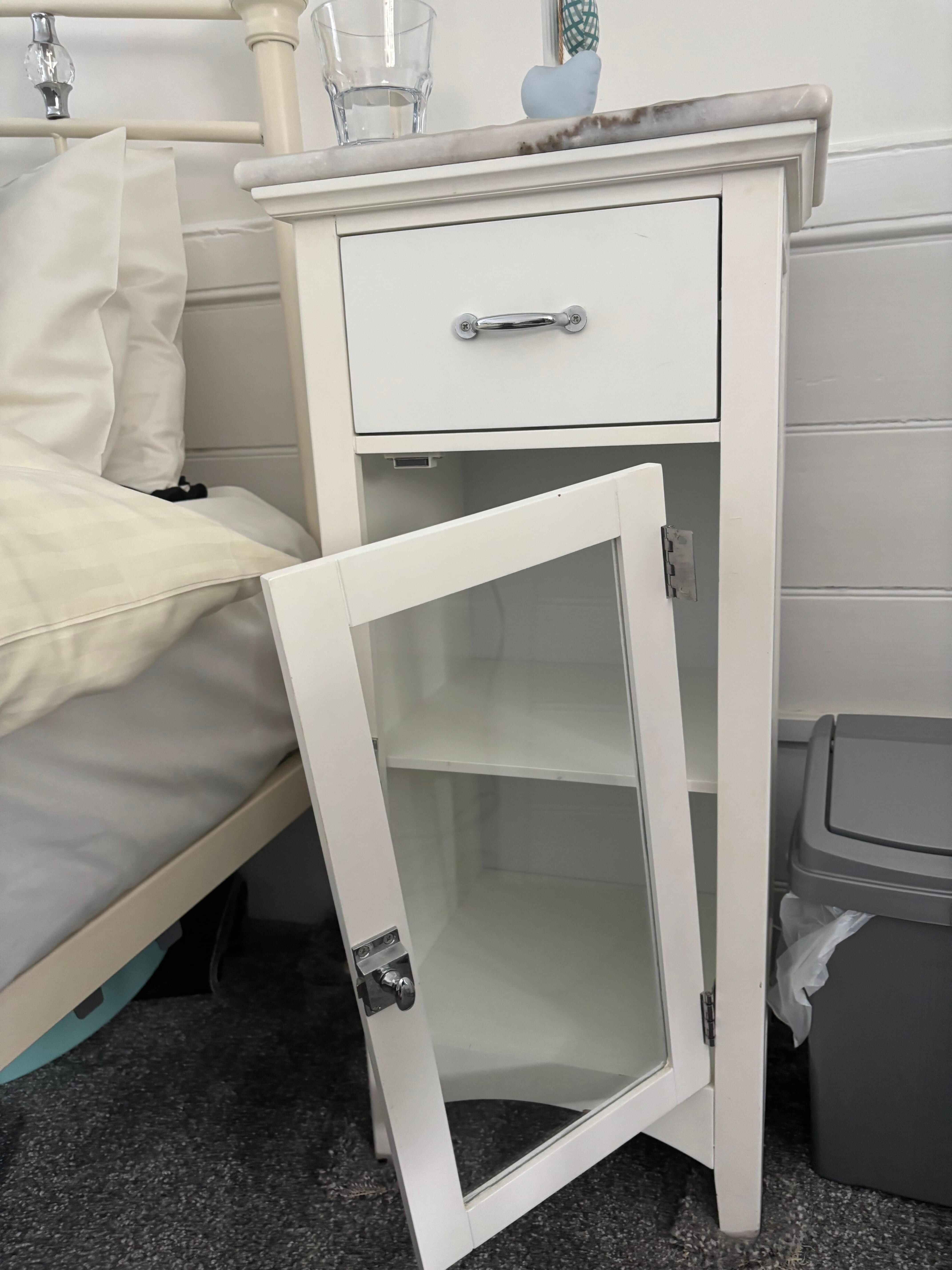 Broken bedside cabinet