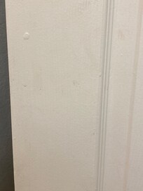 Bathroom door unclean. Can’t tell if someone got sick or if it’s vape residue.