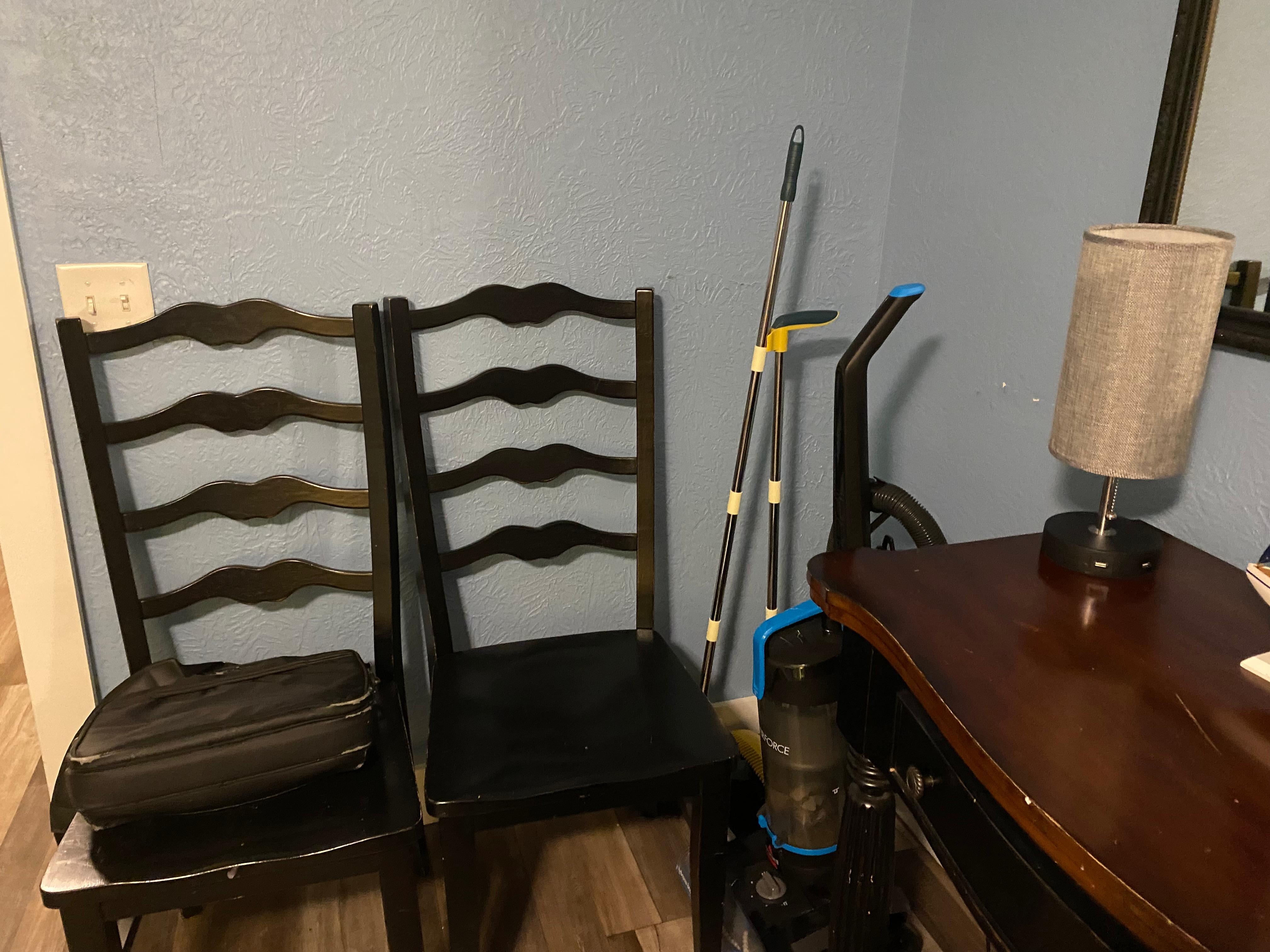Vaccuum/broom took up space in living room