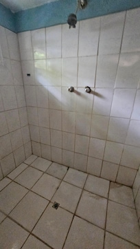 State of bathroom. Badly in need of reno