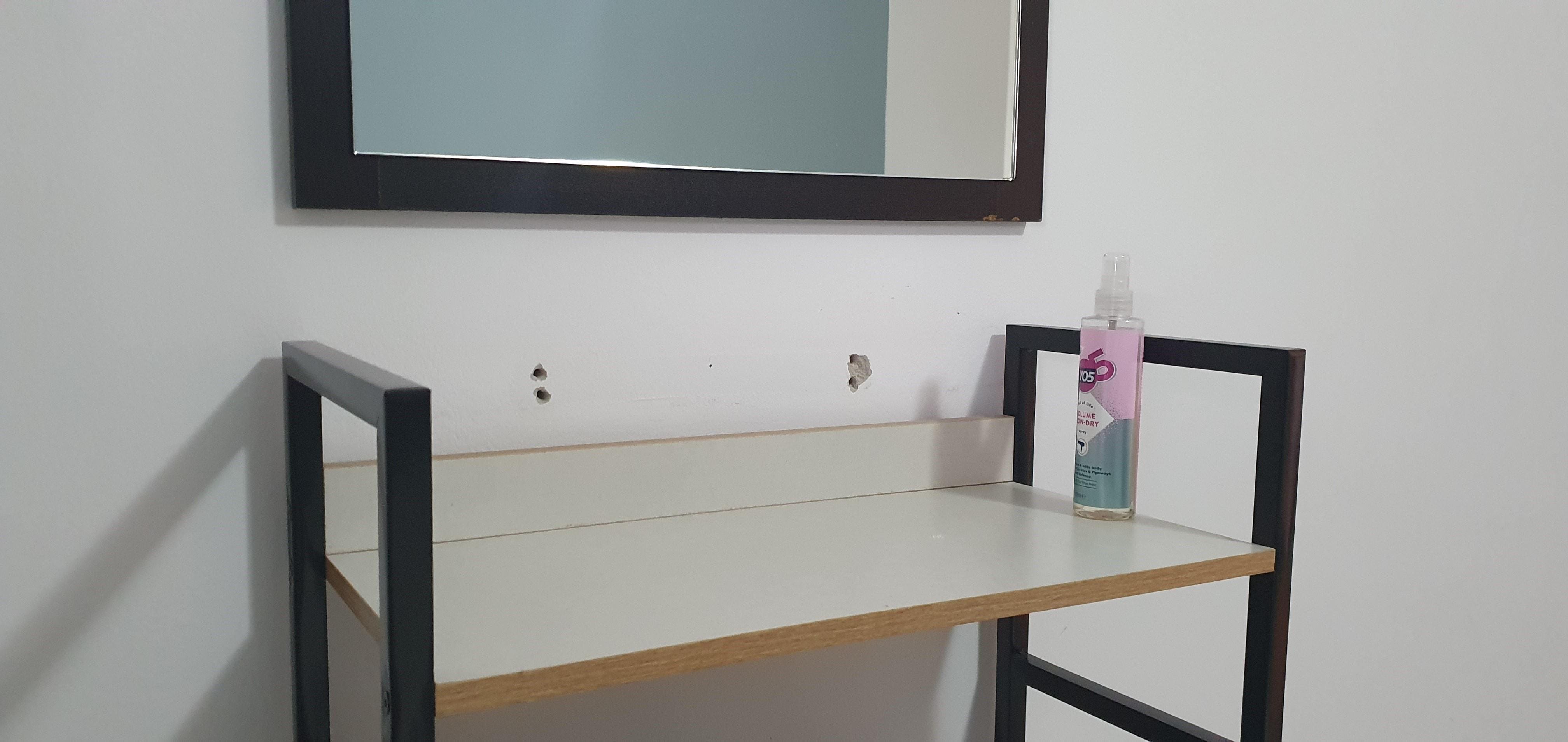 Holes in bedroom wall