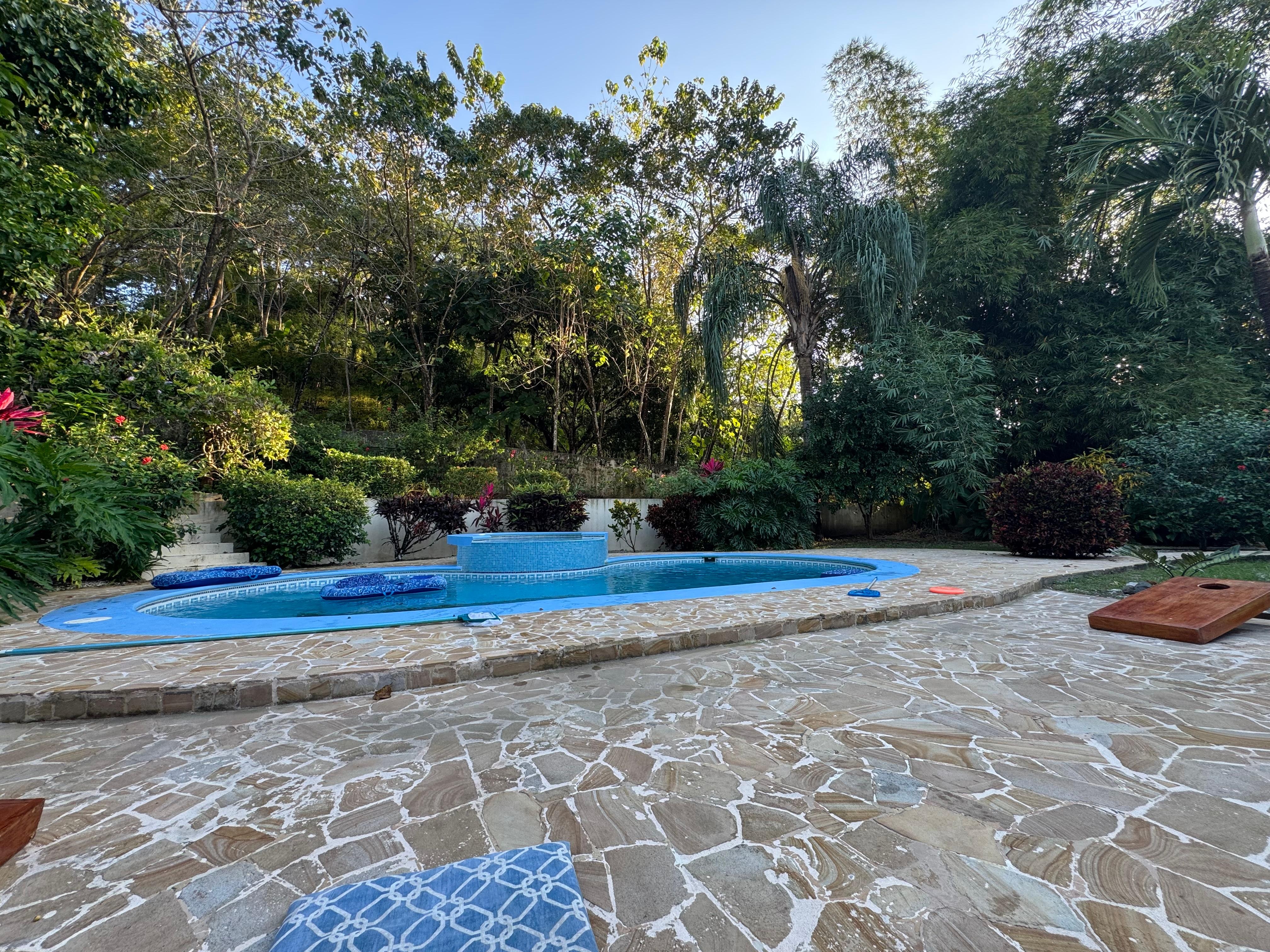 Pool area, looking toward the private backyard 