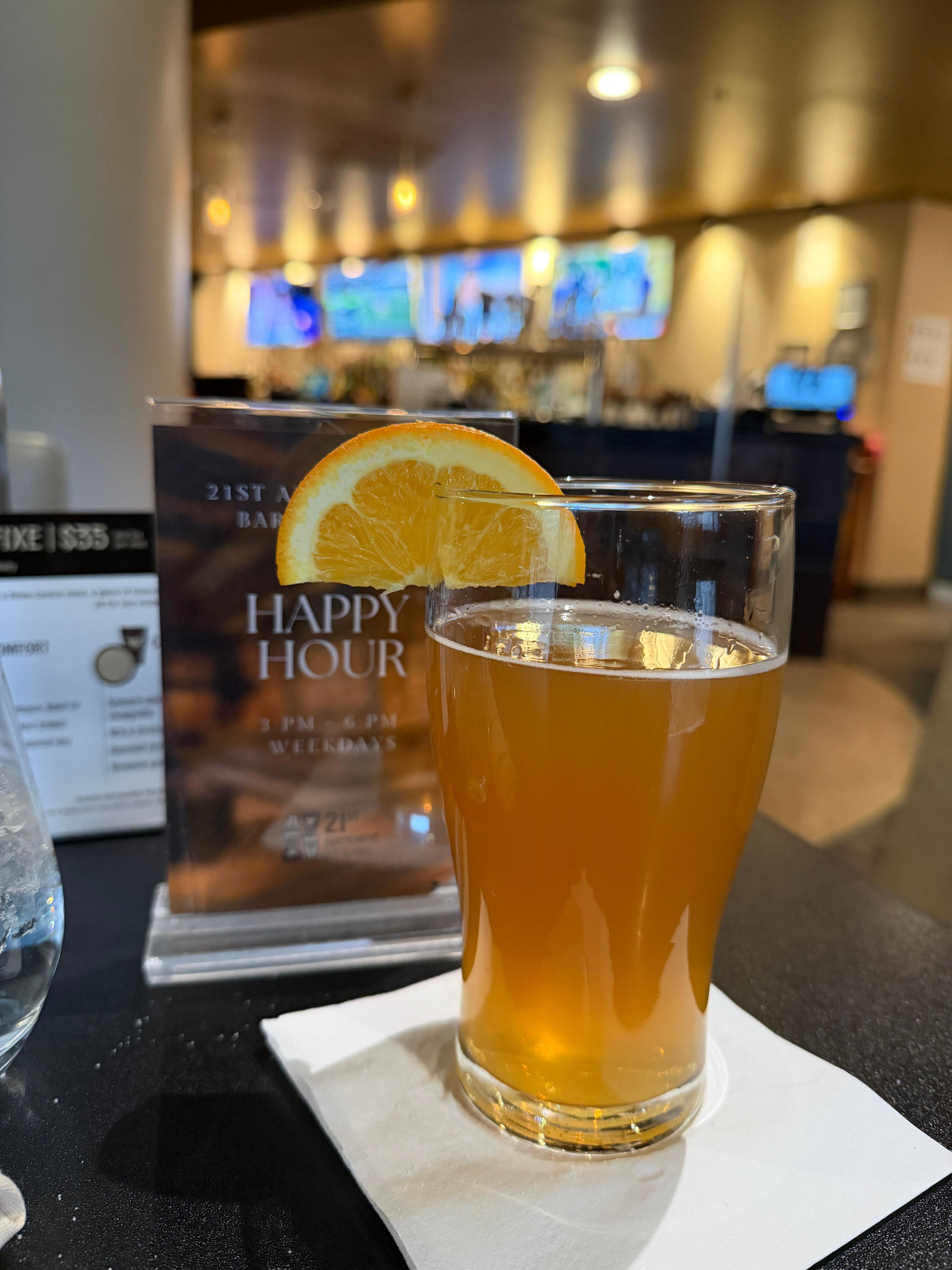 Nice orange fizzy drink with multiple sports on many tvs 