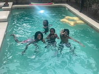 Kids enjoying the pool.