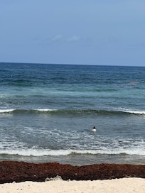 The 9 year old was able to play in the waves with water shoes on