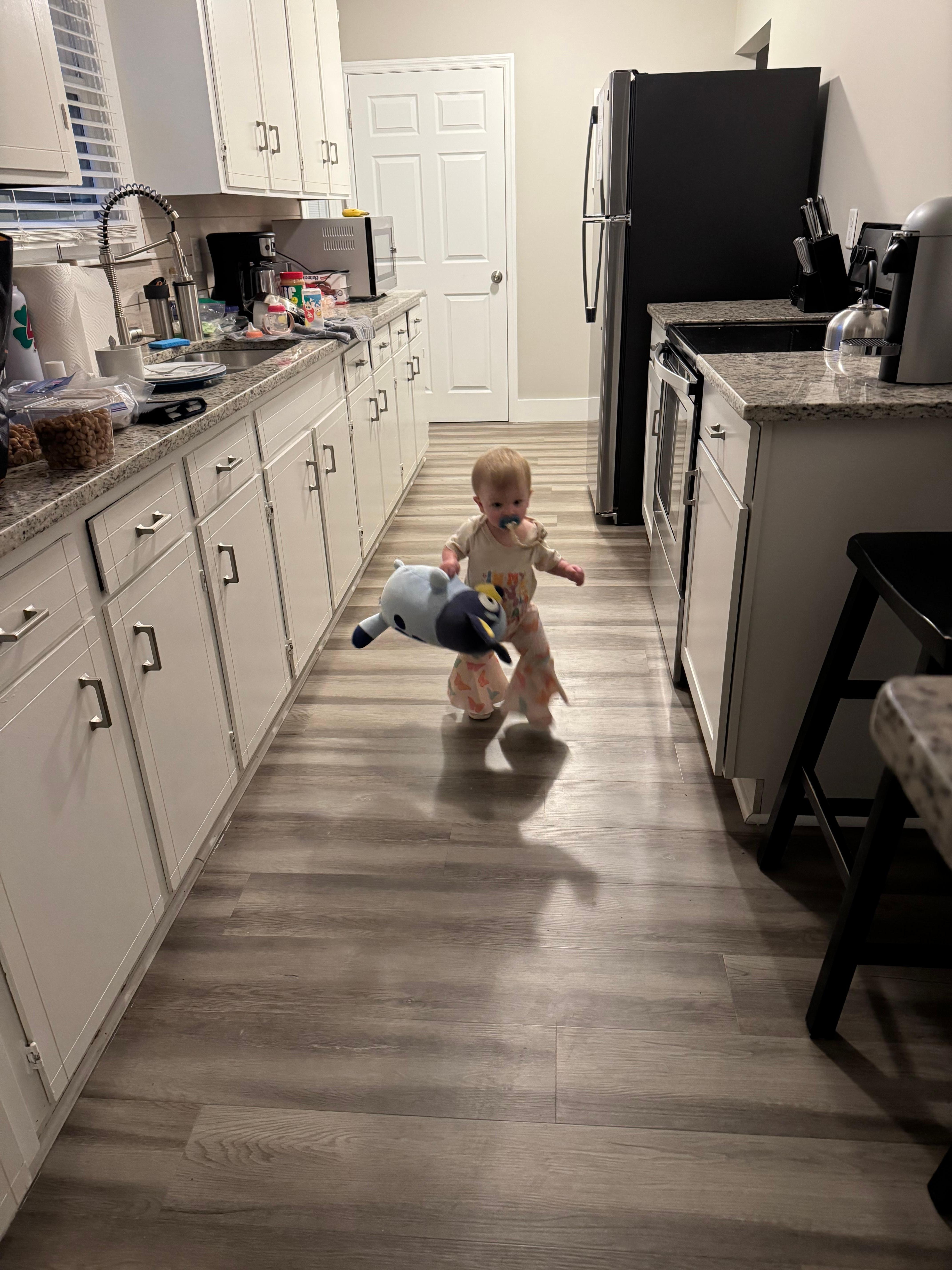 Granddaughter enjoying all of the walking she could do , especially when we were going to get her. 