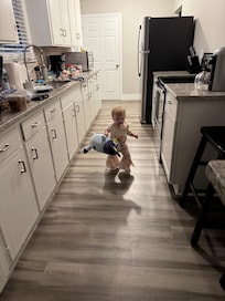 Granddaughter enjoying all of the walking she could do , especially when we were going to get her.