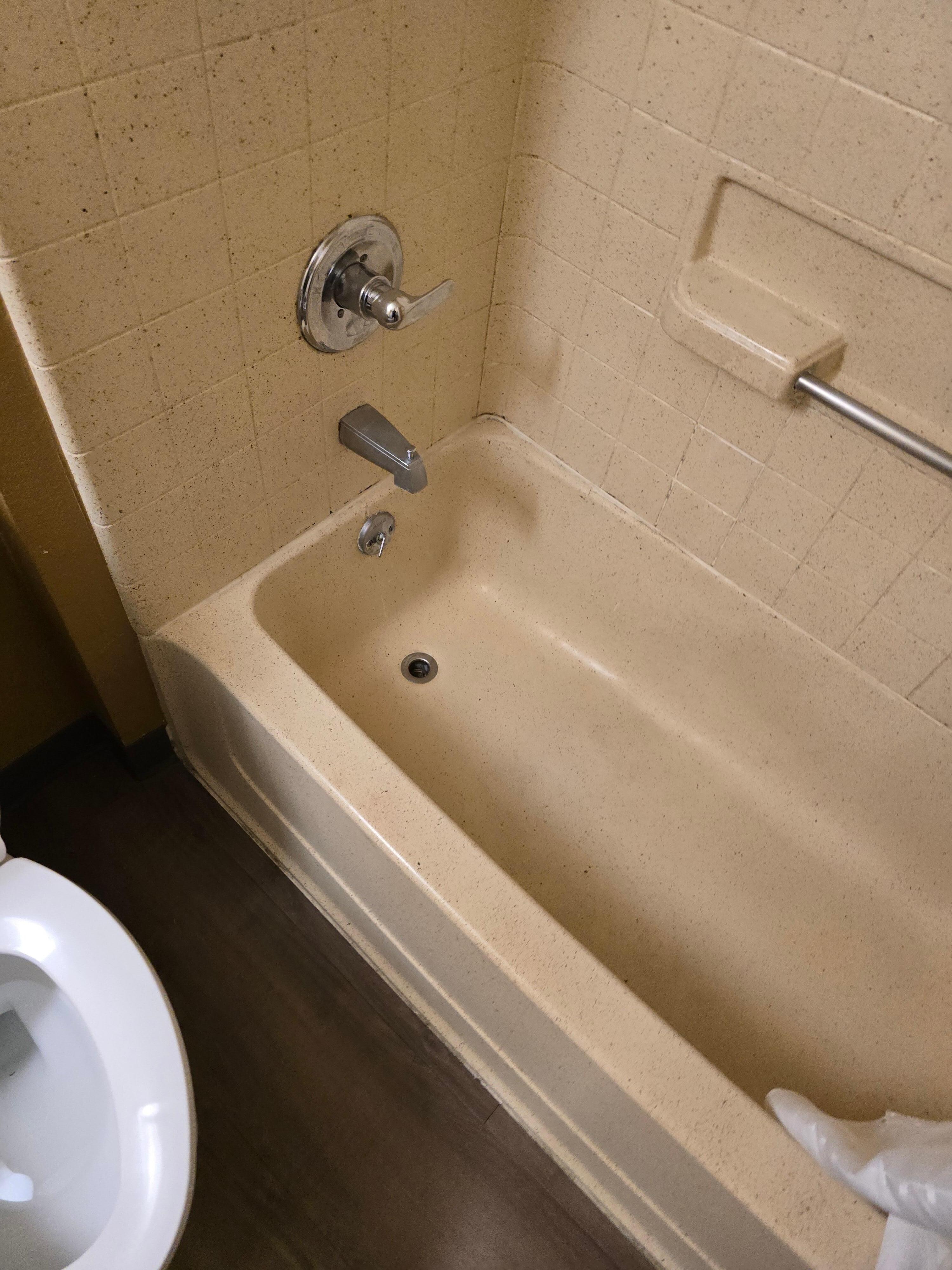 Tub with hair die all over it