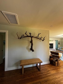 Beautiful grape wood art piece in the dining area.