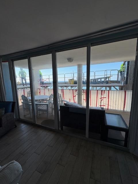 Noise and scaffolding outside balcony and railing all covered with plastic 