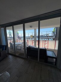 Noise and scaffolding outside balcony and railing all covered with plastic