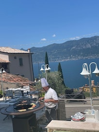 Chef in action at outdoor grill
