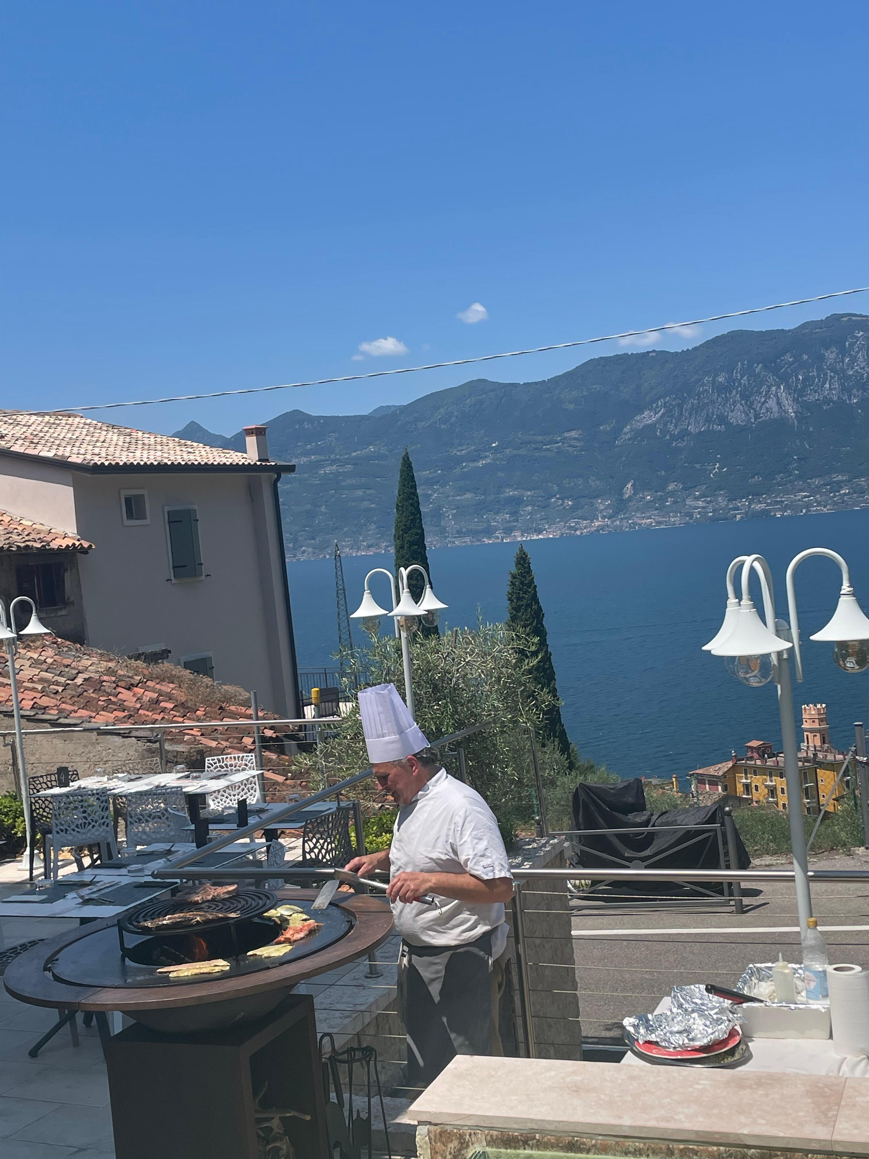 Chef in action at outdoor grill