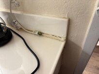 Sink countertop was sagging and there’s not enough caulk to hide it.