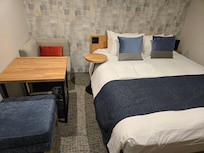 Tables next to bed