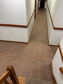 Filthy carpets and loose floor tiles are a theme here.
