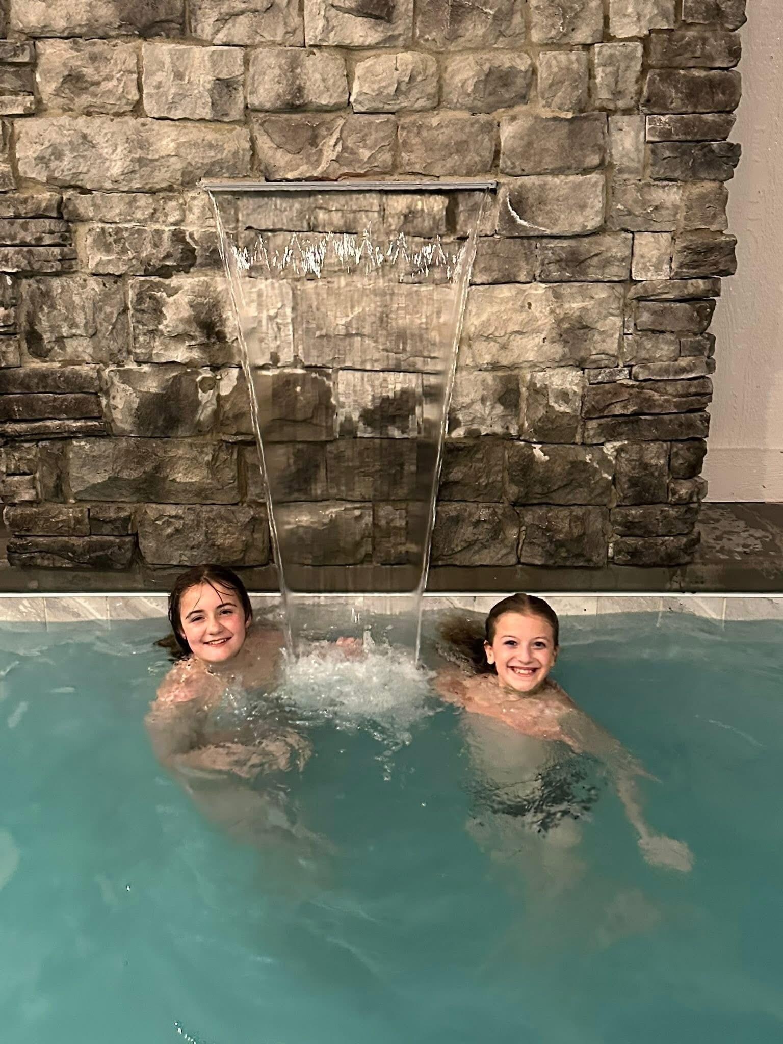 Kids playing in the pool 