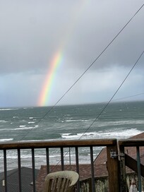 Rainbow after the storm photo from back of house