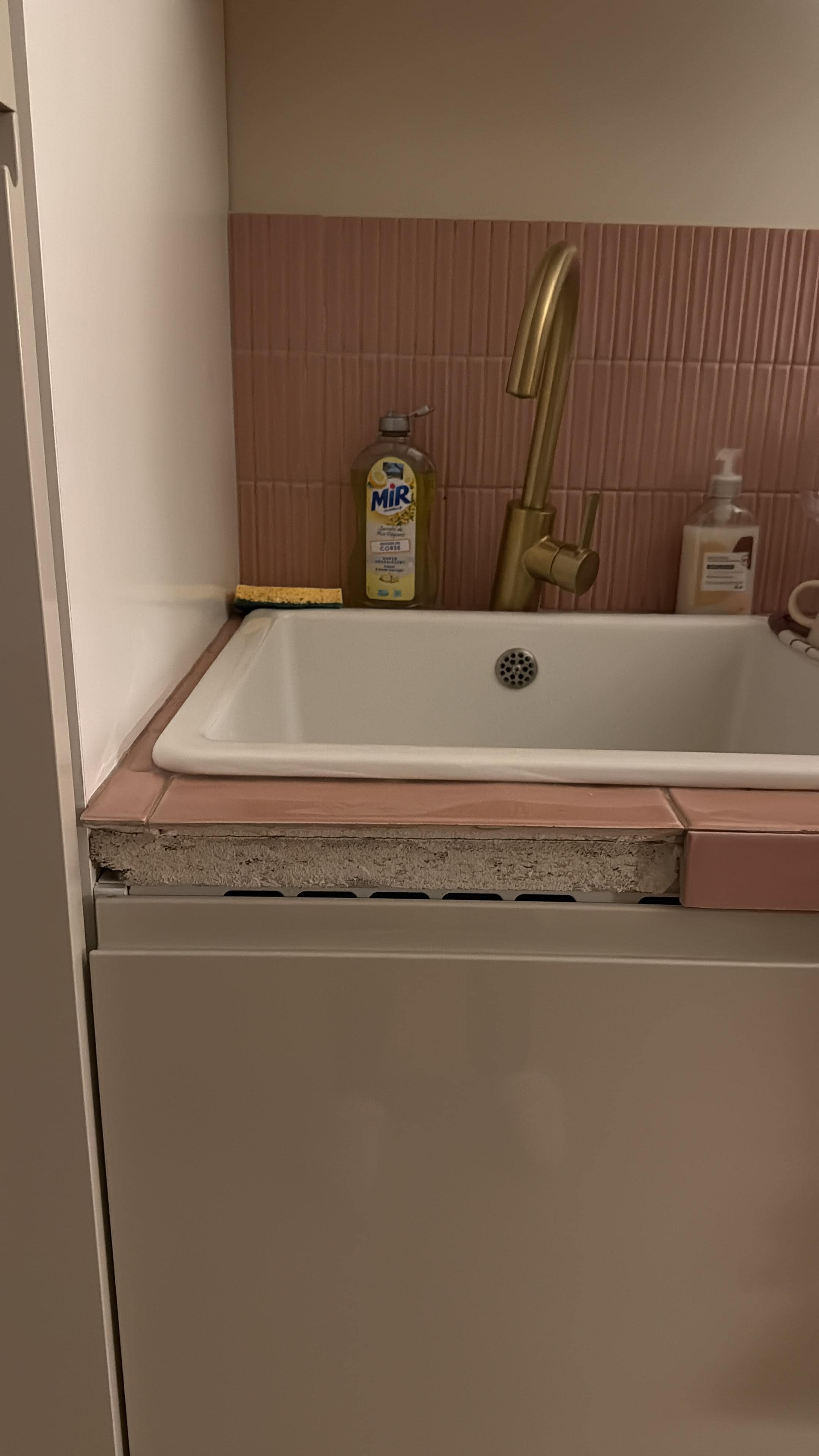 Kitchen counter needed tile work too. 