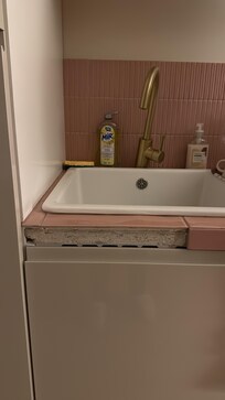 Kitchen counter needed tile work too.