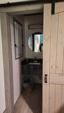 Bathroom with barn door