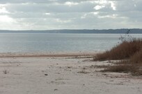 Quiet lake front with beautiful views.