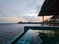 View of covered patio from private plunge pool.