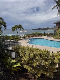 View out balconies to pool and ocean