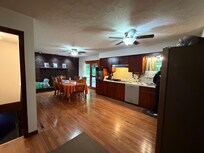 Large kitchen table to seat large crowd with room to cook
