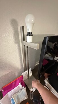 Room 204. Lamp doesn’t have any cover