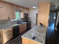 Very functional kitchen thats fully stocked