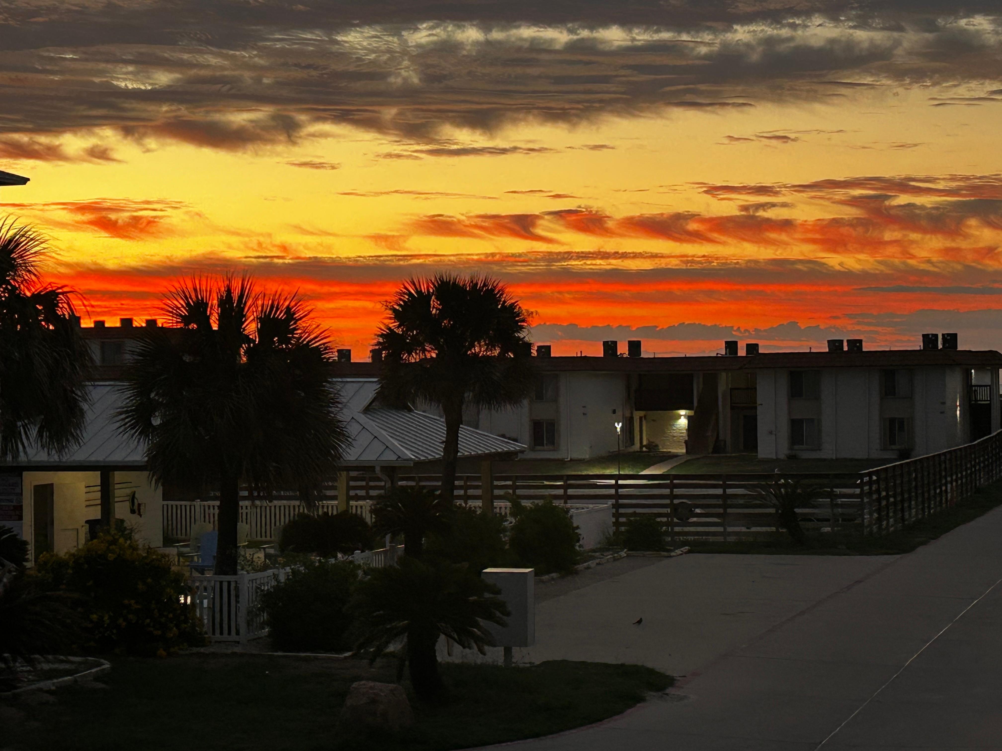 Sunrise off the condo balcony.