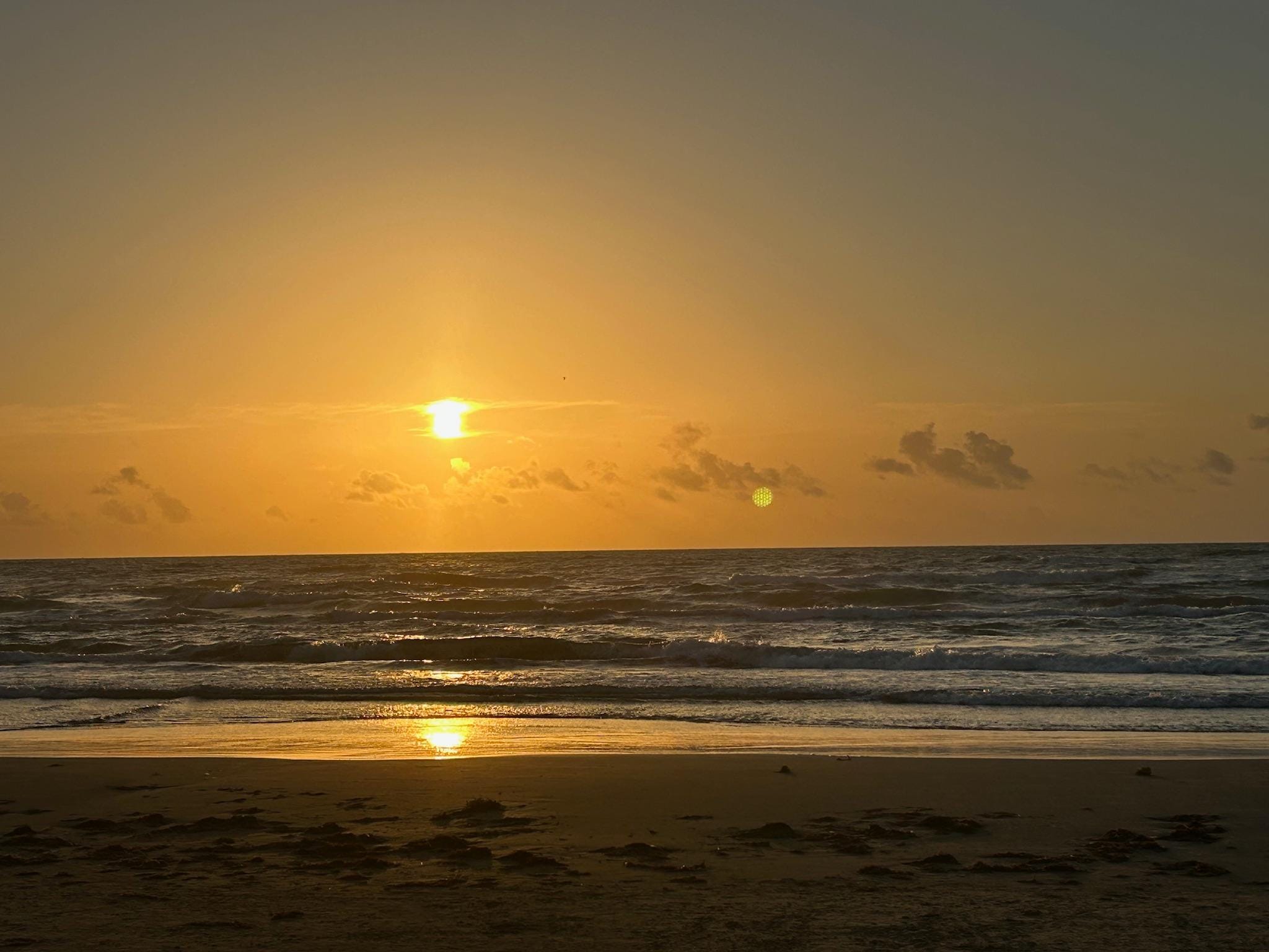 Sunrise from the beach right out in front of the condo 