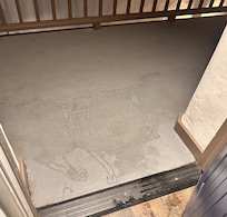 Puddle of water without a matt