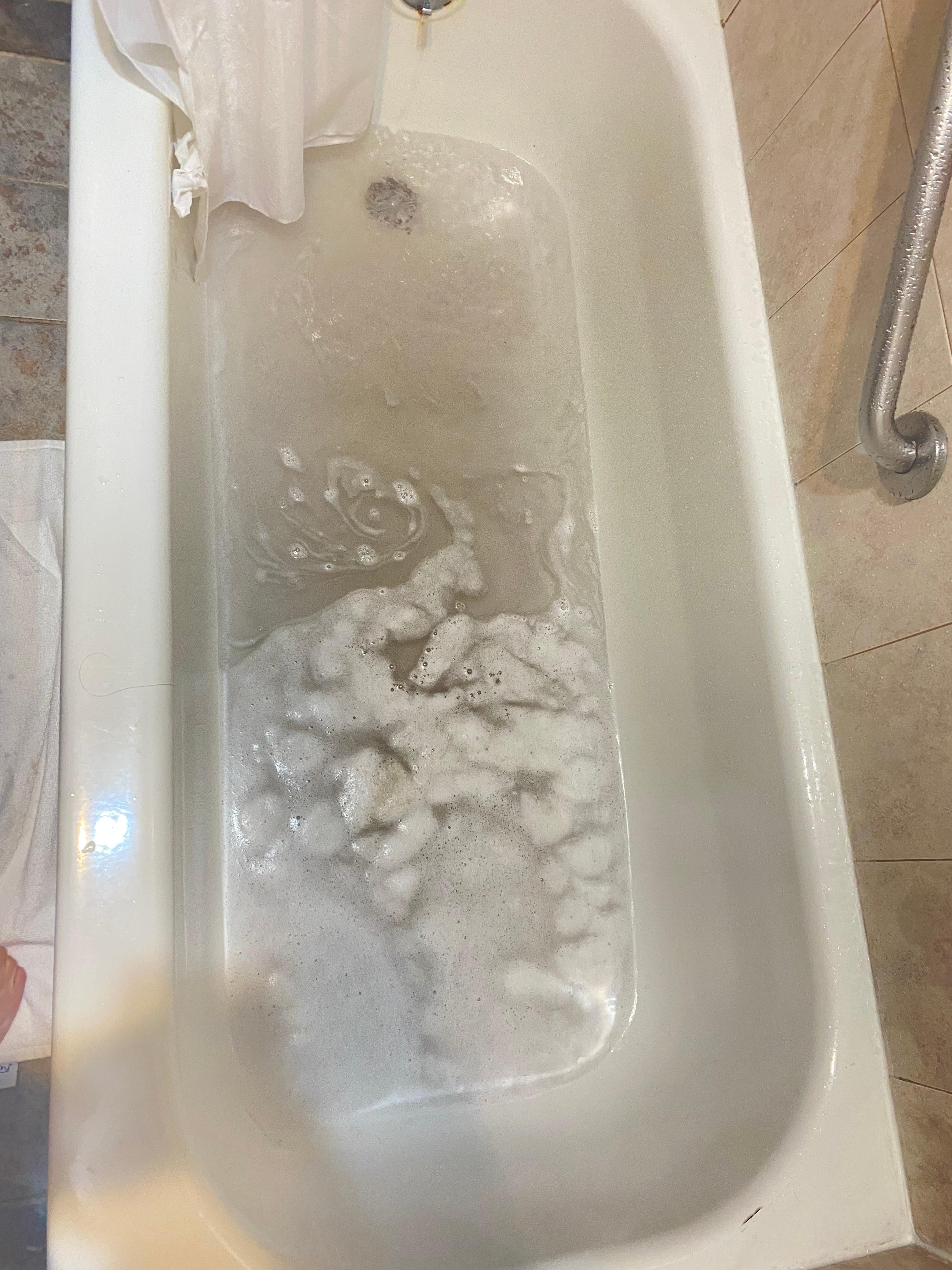 The water that stands after a shower and why is it so dark?