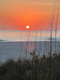 Steps from a beautiful beach sunset.