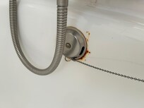 Rust spots in shower with cheap shower curtains